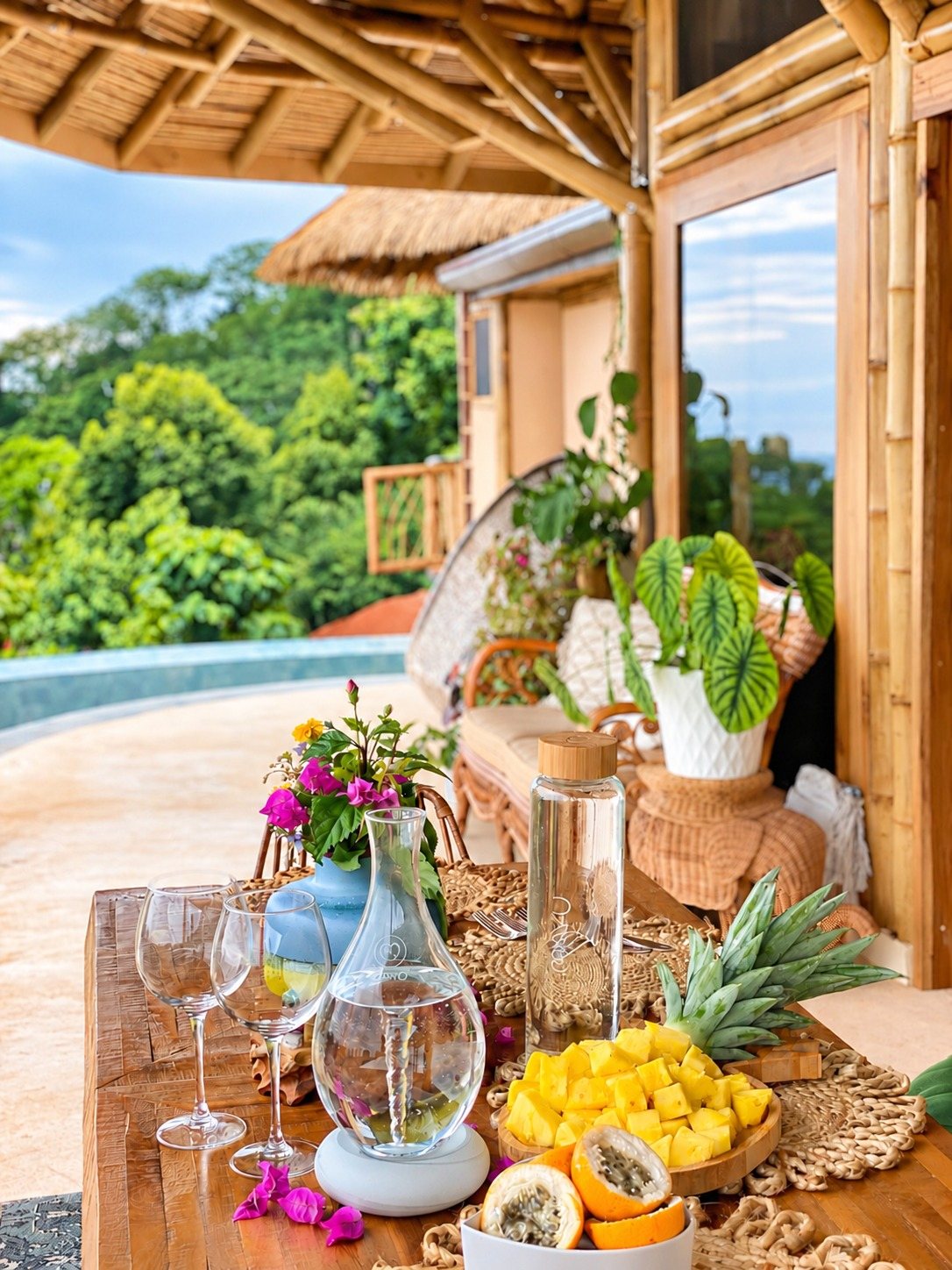 Bamboo Villa terrace with tropical fruit, bamboo architecture and rainforest views