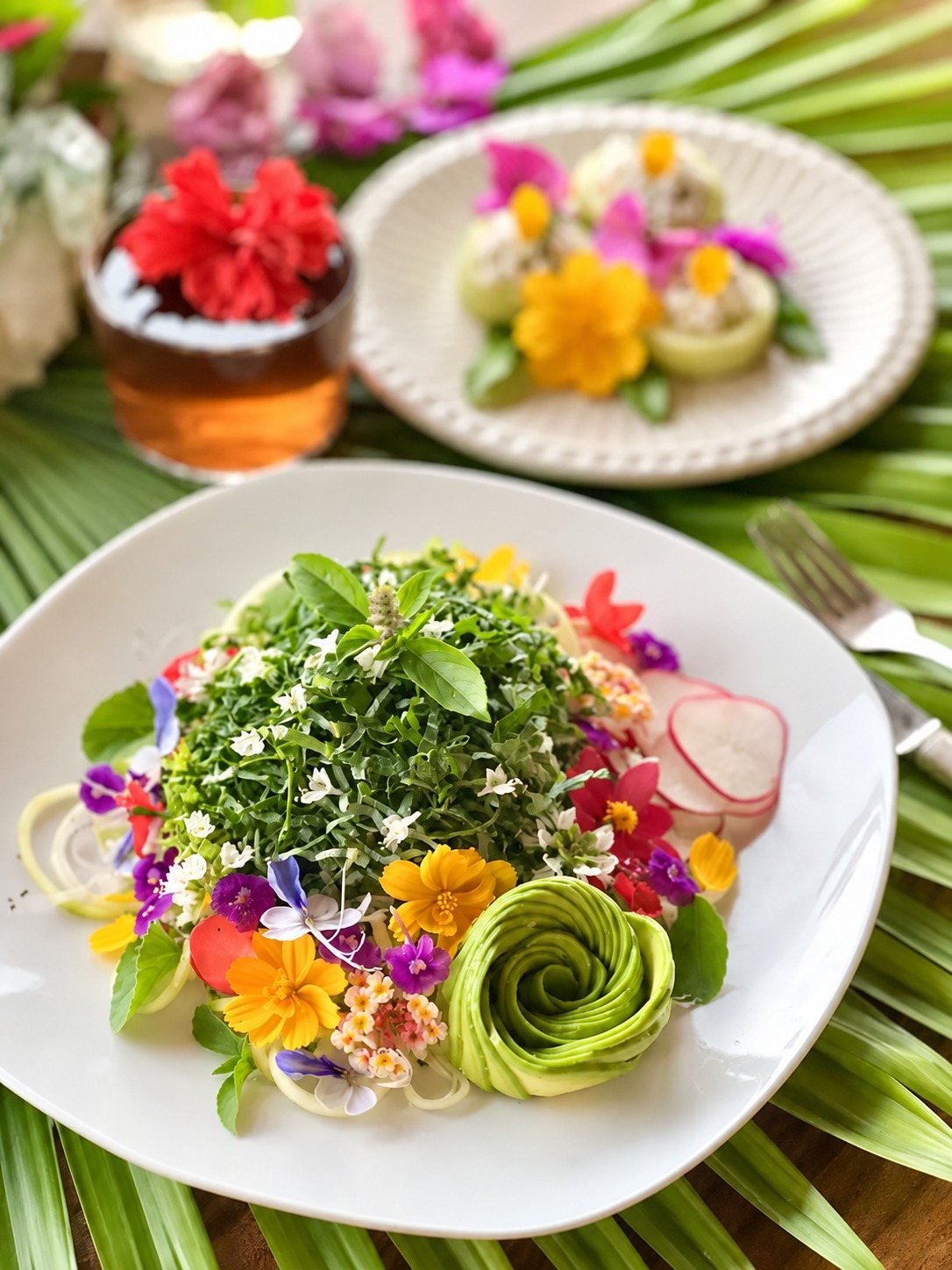 Fresh plant-based dishes prepared with tropical garden ingredients