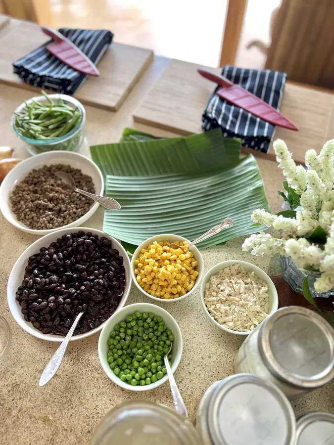 Beans, lentils and vegetables set out for a hands-on food workshop