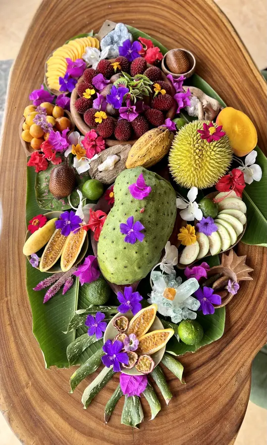 Abundant exotic tropical fruit and garden flowers