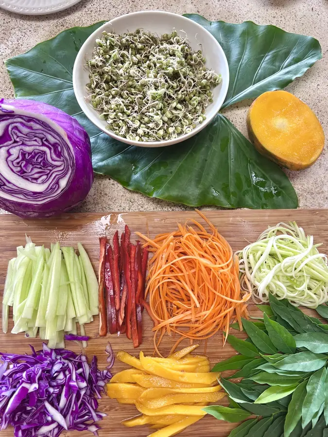 Whole-food ingredients, sprouts, mango and garden vegetables