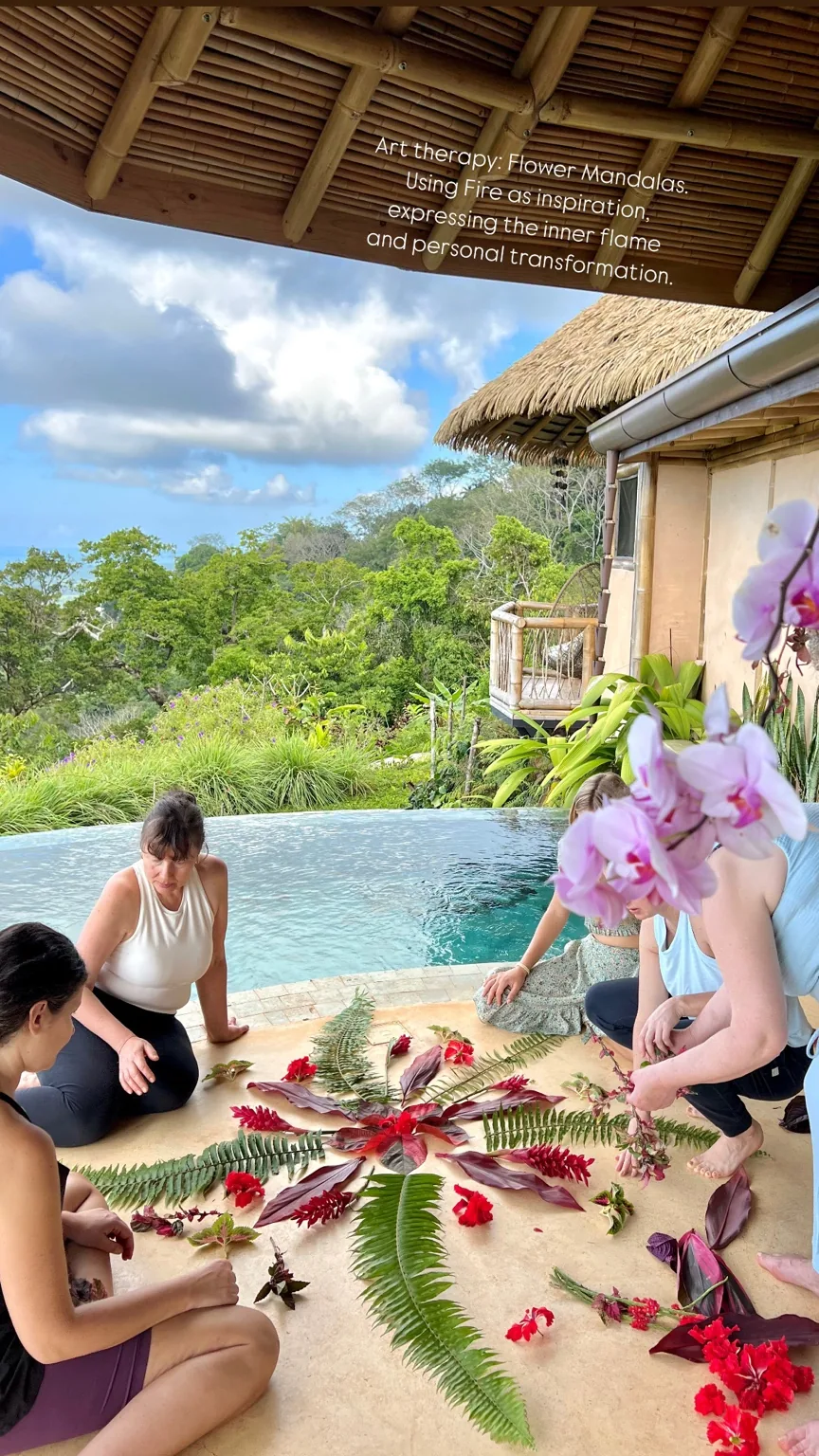 Guests creating a flower mandala beside the Wilder pool