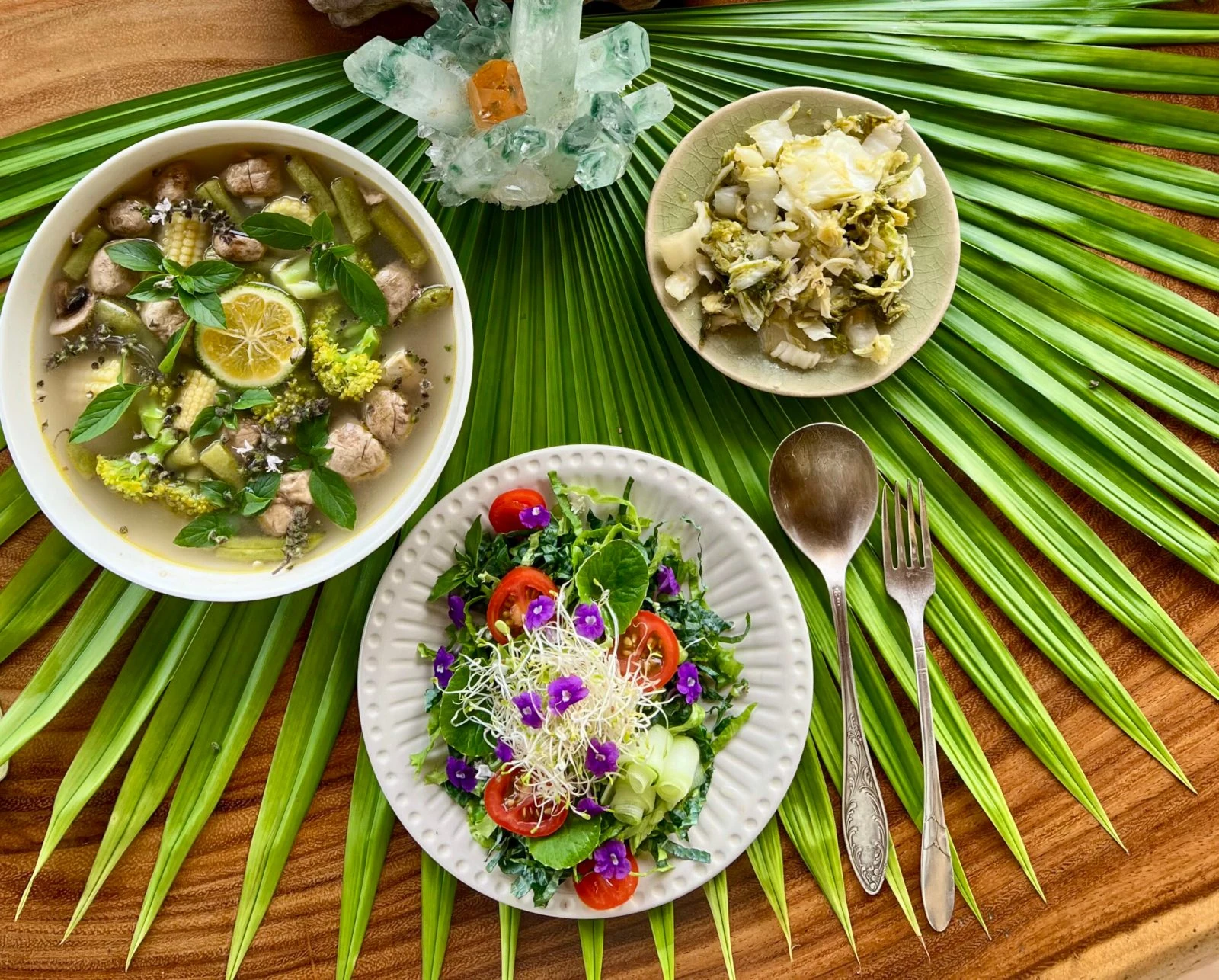Garden-to-table plant-based dishes served on tropical leaves