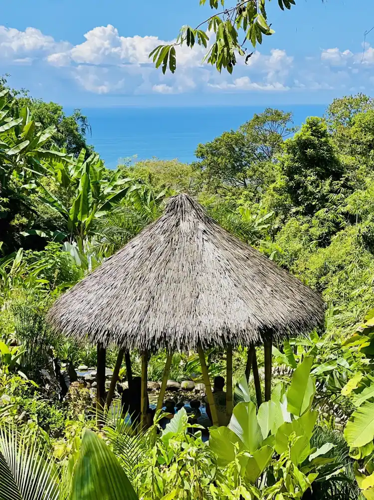 Lush garden pavilion with a view of the Pacific