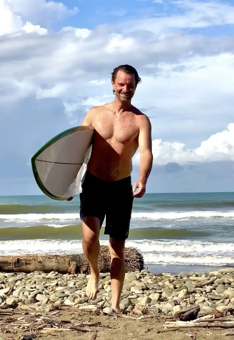 Scott arriving from a surf session on the Pacific coast